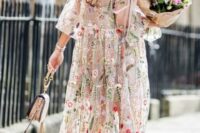 26 a lovely midi dress with colorful floral embroidery, hot pink shoes, a blush bag with a ring handle for a spring or summer wedding
