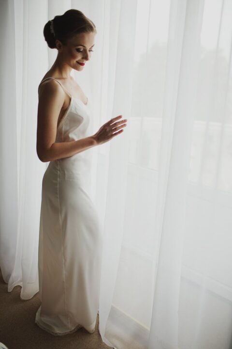 a white maxi dress with a lace edge is a lovely alternative to lingerie and pajamas