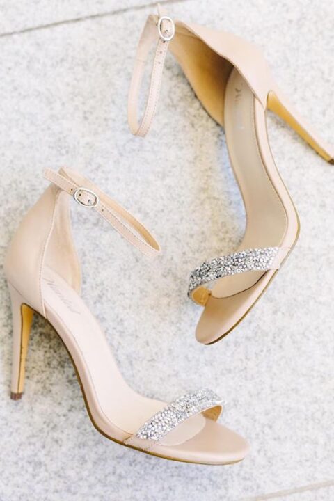 classy nude wedding shoes with embellished tops and high heels are fantastic for a glam bridal look