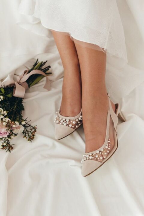 elegant feminine nude wedding slingbacks with sheer pars and pearls are fantastic for a chic and timeless bridal look