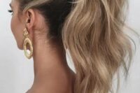 31 a wavy and voluminous high ponytail looks chic and feminine, besides it’s a timeless solution