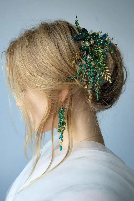 a cool updo with some mess and texture, with locks down and a jaw dropping gold and emerald hairpiece is wow