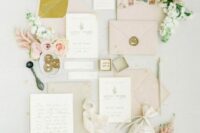 33 a delicate neutral wedding invitation suite with blush and grey envelopes, chic vintage calligraphy, mustard lining and some blooms around