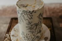 34 a white buttercream wedding cake with pressed blooms and petals is a lovely and very trendy idea