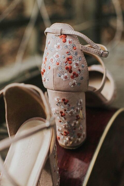 blush wedding shoes with bold floral embroidery and ankle straps are a fantastic idea for a boho bride