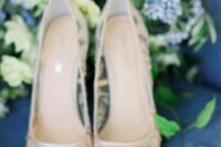 35 semi sheer wedding shoes with delicate pastel floral embroidery are a lovely feminine touch to the bridal look