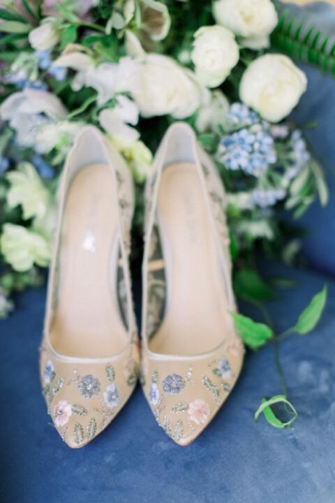 semi sheer wedding shoes with delicate pastel floral embroidery are a lovely feminine touch to the bridal look