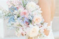 a charming spring pastel wedding bouqeut