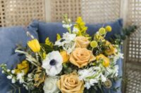 37 a bright yellow wedding bouquet with various blooms, billy balls, some greenery and ribbons