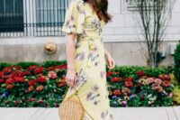37 a yellow wrap maxi dress with short sleeves, beige strappy shoes, a round wicker bag for a spring or summer wedding