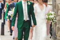 37 an emerald suit with a nude tie and brown shoes for a stylish vintage-inspired wedding