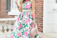 39 an A-line hot pink floral midi dress with no sleeves and a blush sash, with nude shoes and a nude pearl bag for a retro-inspired wedding