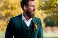 a cool groom’s look with a gorgeous boutonniere