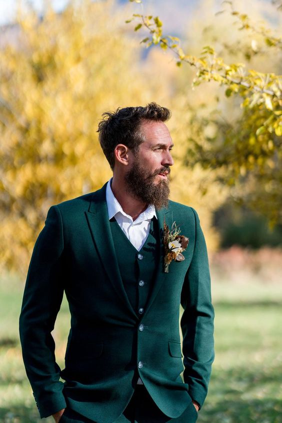 a cool groom's look with a gorgeous boutonniere