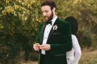 41 an emerald velvet tux with black lapels and black pants is a chic idea if you don’t want any traditional colors