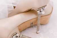 41 nude wedding shoes with embellished high heels and pearls are amazing for a wedding, they can give a chic touch to your look