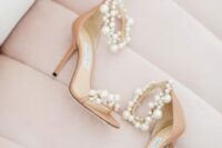 42 nude wedding shoes with high heels and lots of pearls of various sizes are amazing for a wedding