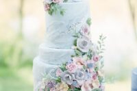 a cute pastel blue wedding cake