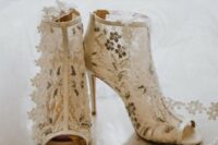 47 fully embellished floral peep toe booties will fit any bridal look – from a summer to a winter one