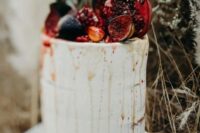 48 a naked fall wedding cake with drip, fresh figs and pomegranates is a lovely decadent idea for a fall celebration