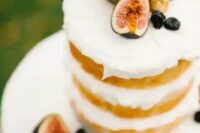 49 a naked wedding cake topped with fresh fruit and berries is a lovely idea for a fall wedding, whether it’s a vineyard one or not