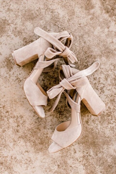 comfortable and cute nude wedding shoes with ties and block heels are a stylish and cool idea for a neutral wedding