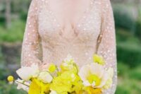 51 a super bold yellow wedding bouquet with various blooms and with billy balls is a real color statement