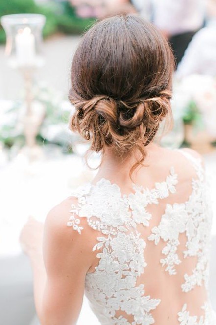 a wavy updo on medium length hair with a bump on top is a very elegant and refined idea