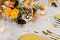 52 a vibrant wedding table setting with printed light grey linens, mustard menus and marigold blooms is amazing