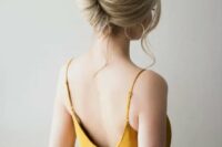 52 an elegant and chic low chignon with a volume on top and some waves down is classics that always works