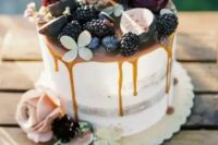 54 a semi naked fall wedding cake with caramel drizzle, blackberries, figs, blooms and succulents on top