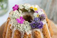 55 a beautiful bundt wedding cake with creamy drip, fresh blooms on top is a great idea for spring and summer