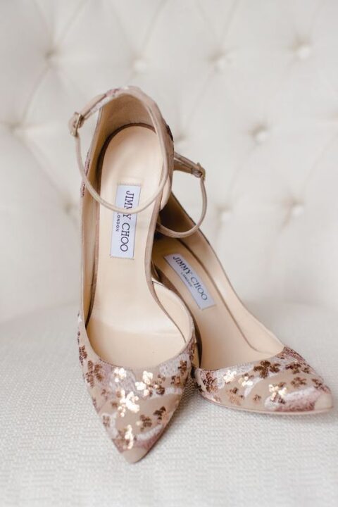 nude wedding shoes wih rose gold embellishments and ankle straps are a very chic and elegant idea for a wedding
