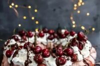 56 a blush pavlova wreath topped with whipped cream, chocolate drip, chocolate sticks and cherries is a lovely idea for a summer or fall wedding