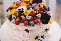 58 a bright meringue wedding cake with pansies and fresh berries is a gorgeous idea for a colorful summer wedding, it looks very inspiring