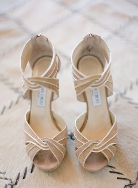 whimsy nude and white Jimmy Choo wedding shoes with twists look very stylish and cool