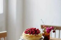62 a crepe wedding cake topped with fresh red berries is a lovely idea for a summer wedding or for a fall one