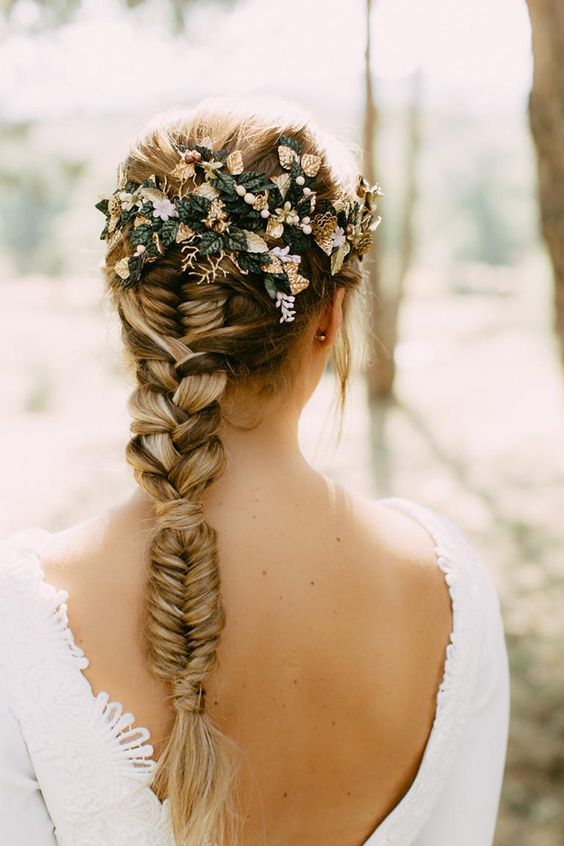 a creative wedding braid with a fishtail, then usual and then fishtail braid plus leaves decorating the back of the head is amazing