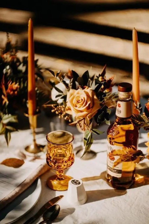 amber bottles and glasses, amber candles and menus are perfect for accenting a fall tablescape