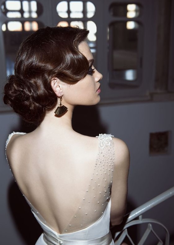 a fantastic vintage wave updo with a low twisted bun looks ultimately refined and very chic