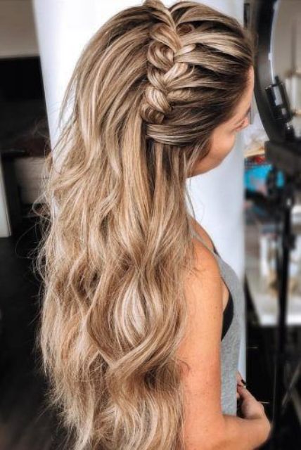 a beautiful long wedding half updo with a braid on top, long waves is amazing for a boho bride