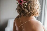 06 a romantic half updo with waves and a texture and some fresh blooms tucked in is a lovely idea for a romantic bride