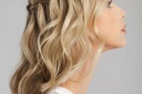 07 a blonde medium length half updo with a braided top and waves down is a stylish boho wedding idea