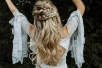 09 a boho half updo with twists and a braided halo, with waves down is a lovely idea for a summer wedding