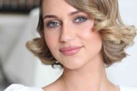 11 a chic light brown mid bob with blonde balayage and vintage curls on the ends is a sophisticated vintage wedding hairstyle