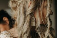 12 a boho wedding half updo with a double braided halo and waves down is a messy and cool hairdo for a wedding
