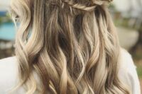 13 a boho wedding half updo with a double fishtail braid halo and waves down is a dreamy and beautiful idea