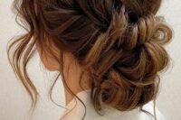 15 a lovely wavy low bun with a wavy and voluminous top, with some locks down is a chic and cool idea with a messy feel