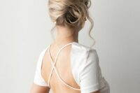 16 a chic twisted French chignon with a bit of mess and some locks down is a cool and bold solution to rock