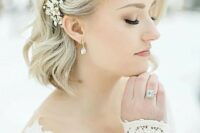 18 a long blonde bob with a lovely crystal hair pin is a chic and lovely idea for a vintage-inspired and romantic bridal look